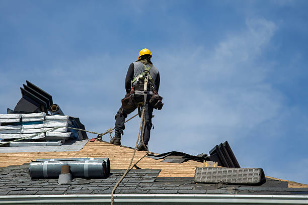 Professional Gutter Installation technician working in West Concord, MA